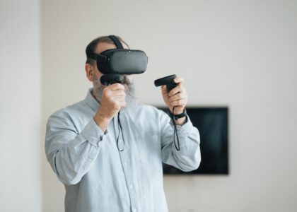The future of language learning. Man is using VR Headset to learn a new language